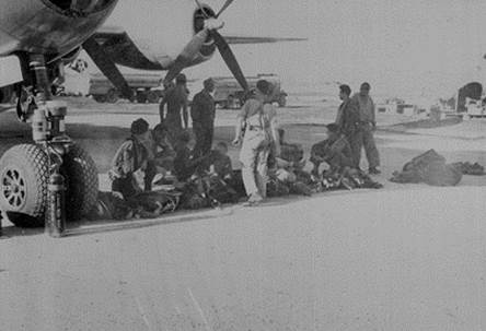 B-29 crew gathering equipment © Archie Miller